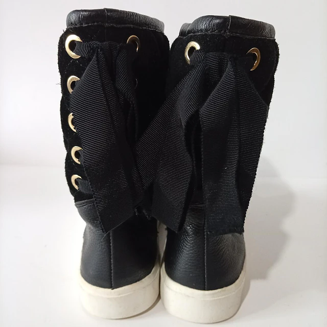 Isaac Mizrahi , cuero ,35 4
