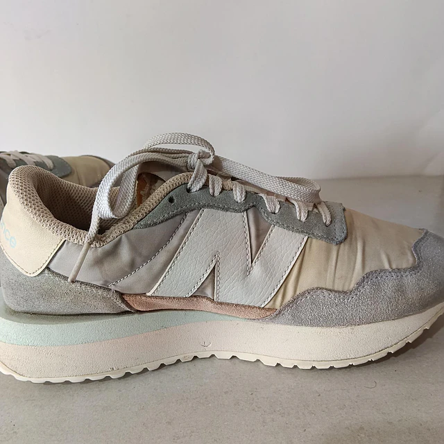 New Balance , 39 2