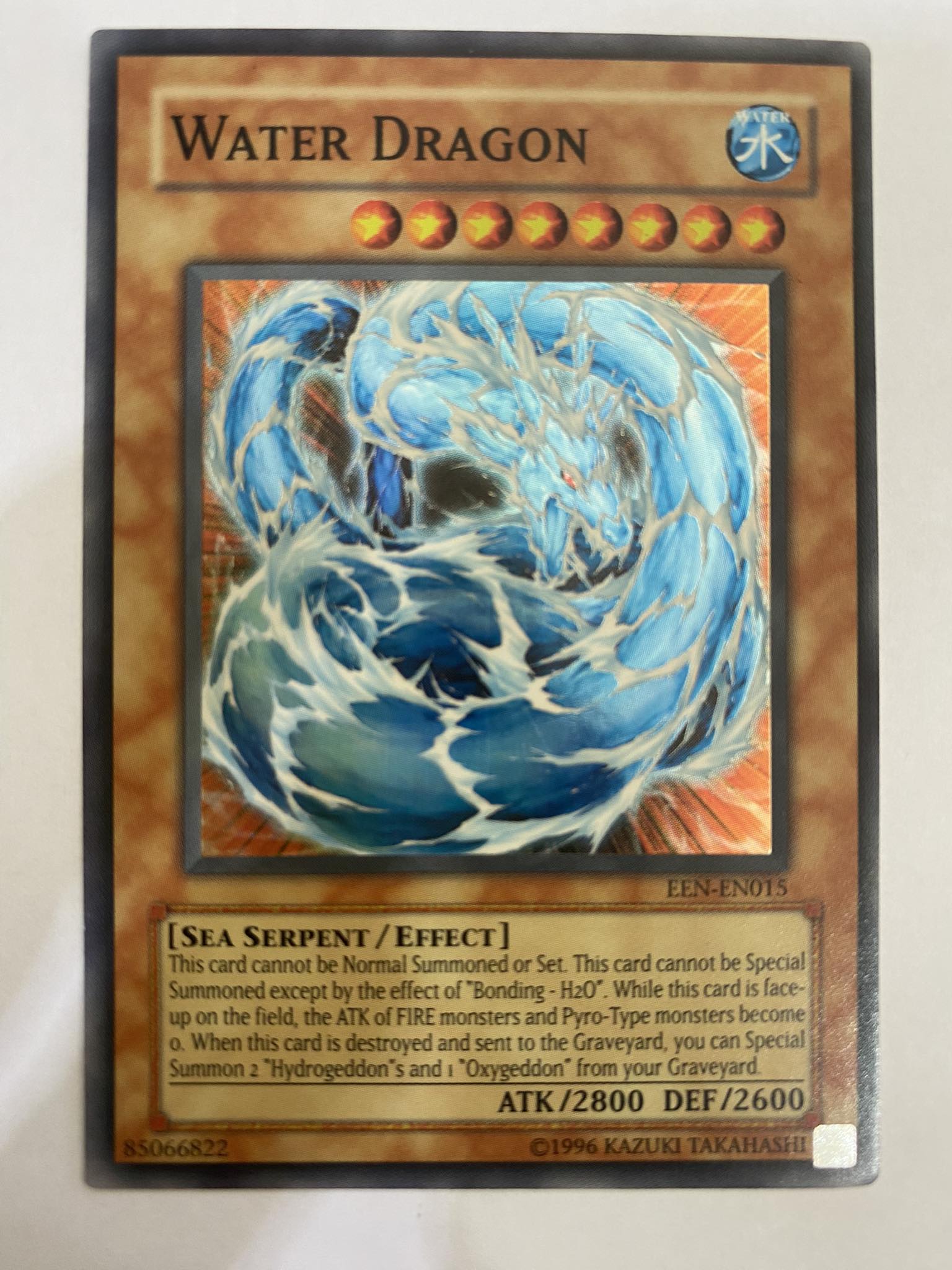 Water Dragon Carta Yugi EEN-EN015 Super Rare