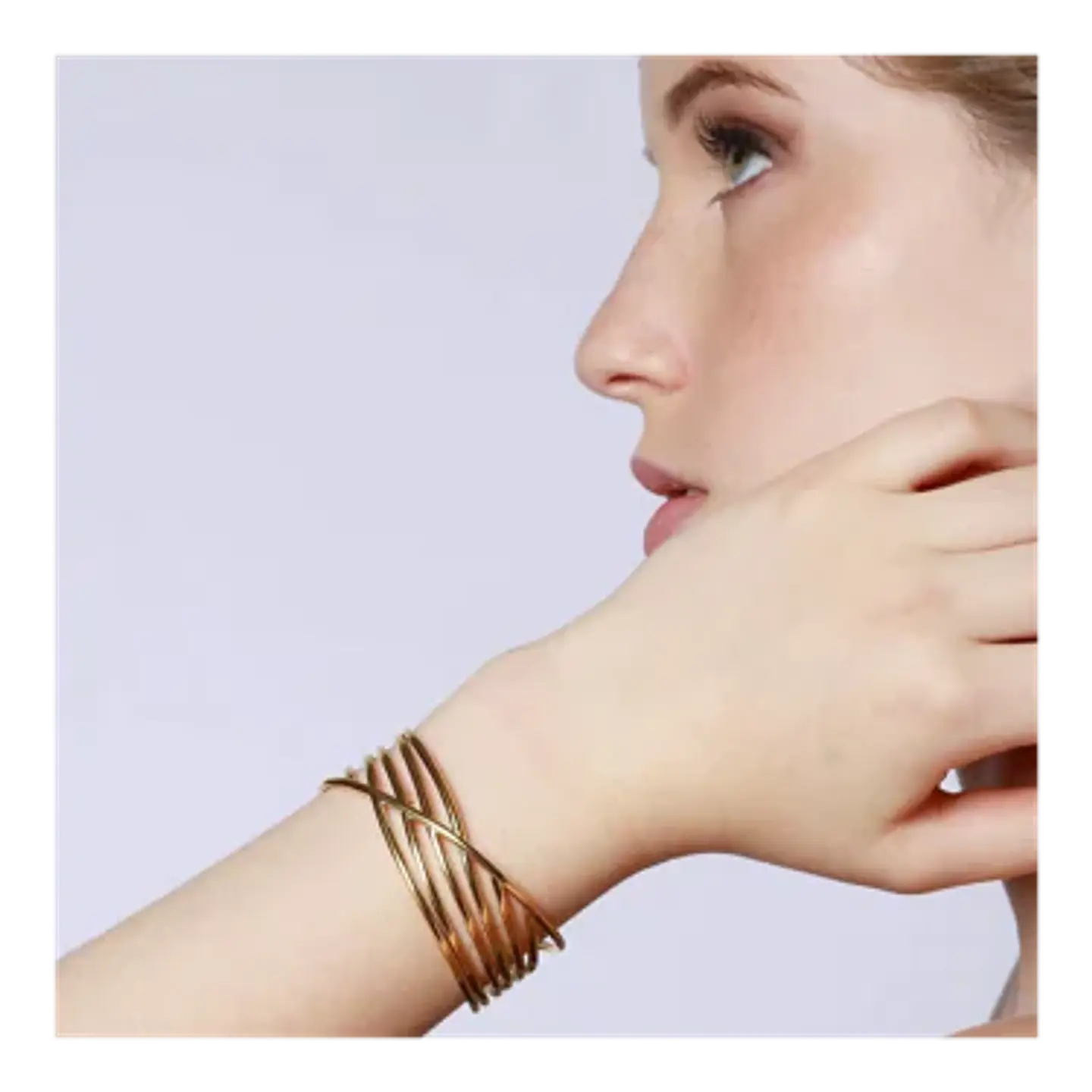 Pulsera rígida de 7 líneas en acero dorado 2