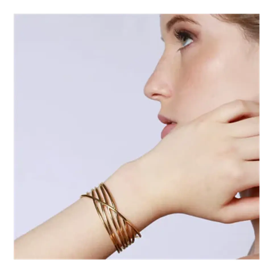 Pulsera rígida de 7 líneas en acero dorado 2