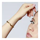Pulsera ondulada de acero dorado. - Miniatura 2