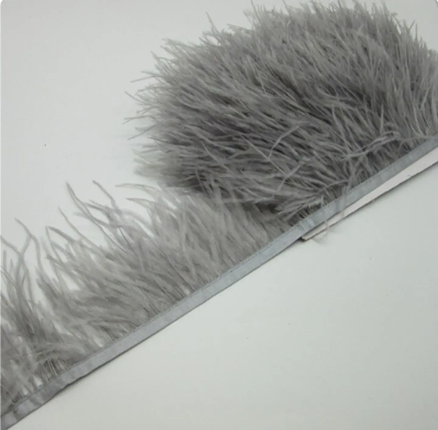 Plumas Gris 1