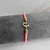 PULSERA CORDÓN INICIAL ROSA FLUOR BAÑO ORO 