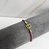 PULSERA CORDÓN INICIAL MORADO CENIZA BAÑO ORO 