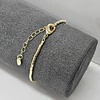 PULSERA MOSTACILLA TUBO SEPARADOR CIRCÓN 17CM ENCH.ORO