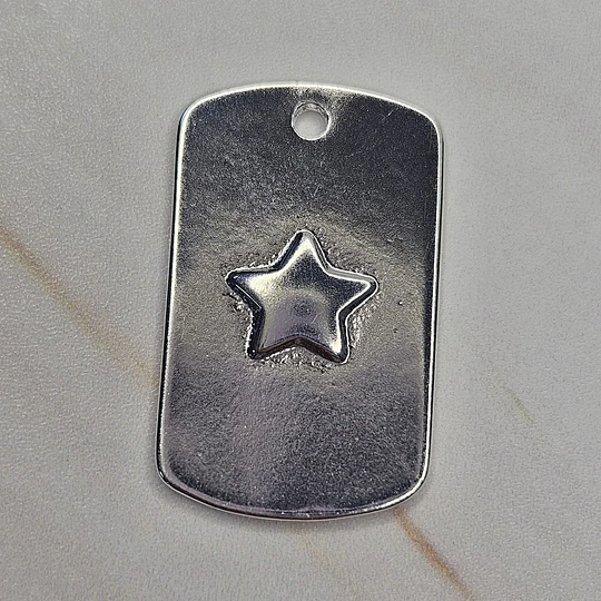 COLGANTE PLACA ESTRELLA LISA 23MM ENCH.PLATA