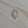 CONECTOR OVALADO VIRGEN DE LOS RAYOS 15MM ENCH.PLATA