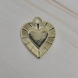 COLGANTE CORAZÓN TALLADO 21MM ENCH.ORO