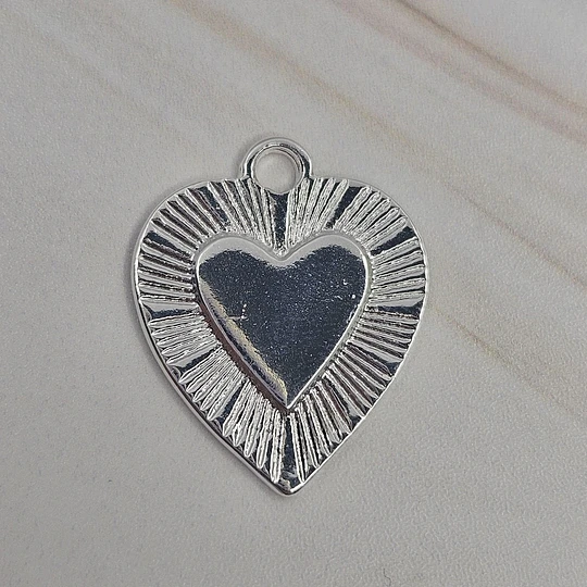 COLGANTE CORAZÓN TALLADO 21MM ENCH.PLATA