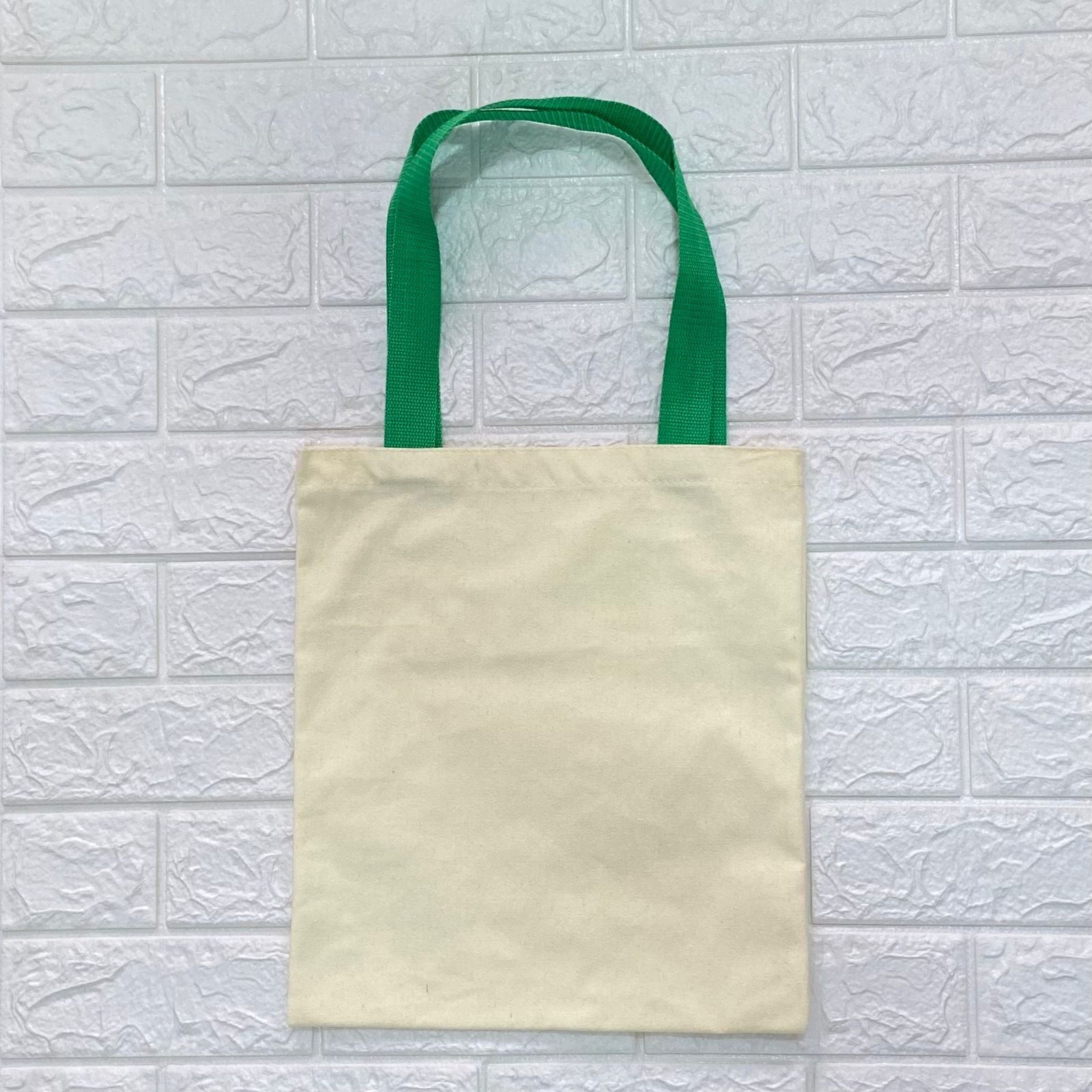Pre venta. Bolsa Crudo Poliester Color Mantequilla 35x30 cm. Asa Huincha Verde