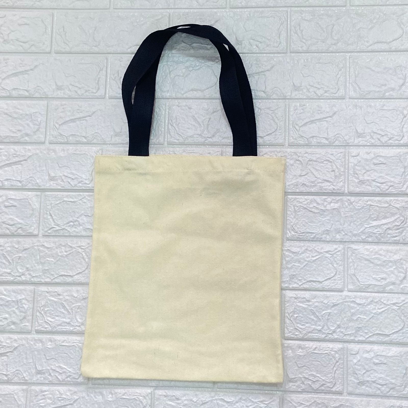 Pre venta. Bolsa Crudo Poliester Color Mantequilla 35x30 cm. Asa Huincha Negro