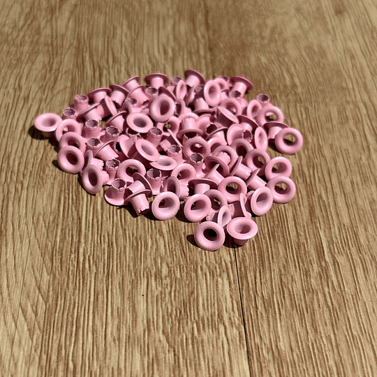 Ojetillos Color rosado (100 unid)