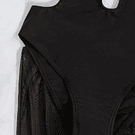 Traje de baño negro escote pronunciado y falda