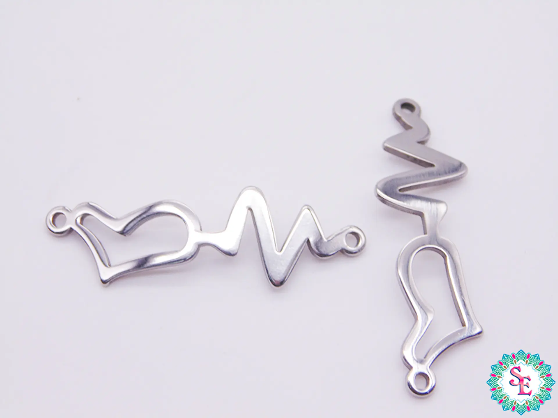 ACERO PLATEADO DIJE PULCERA CORAZON SIGNO VID 31*10MM  1