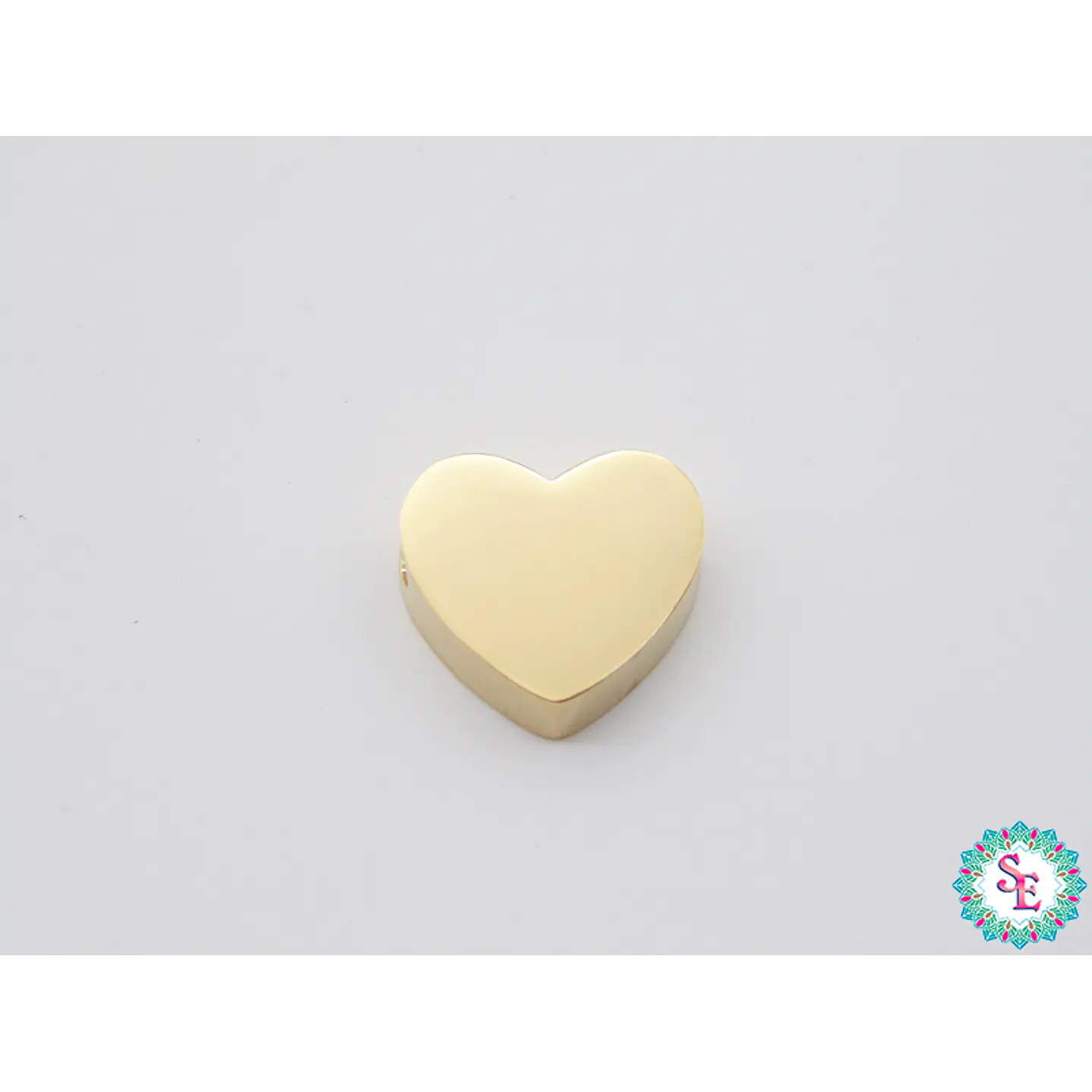 ACERO DORADO SEPARADOR CORAZON 10*9MM X UND  1