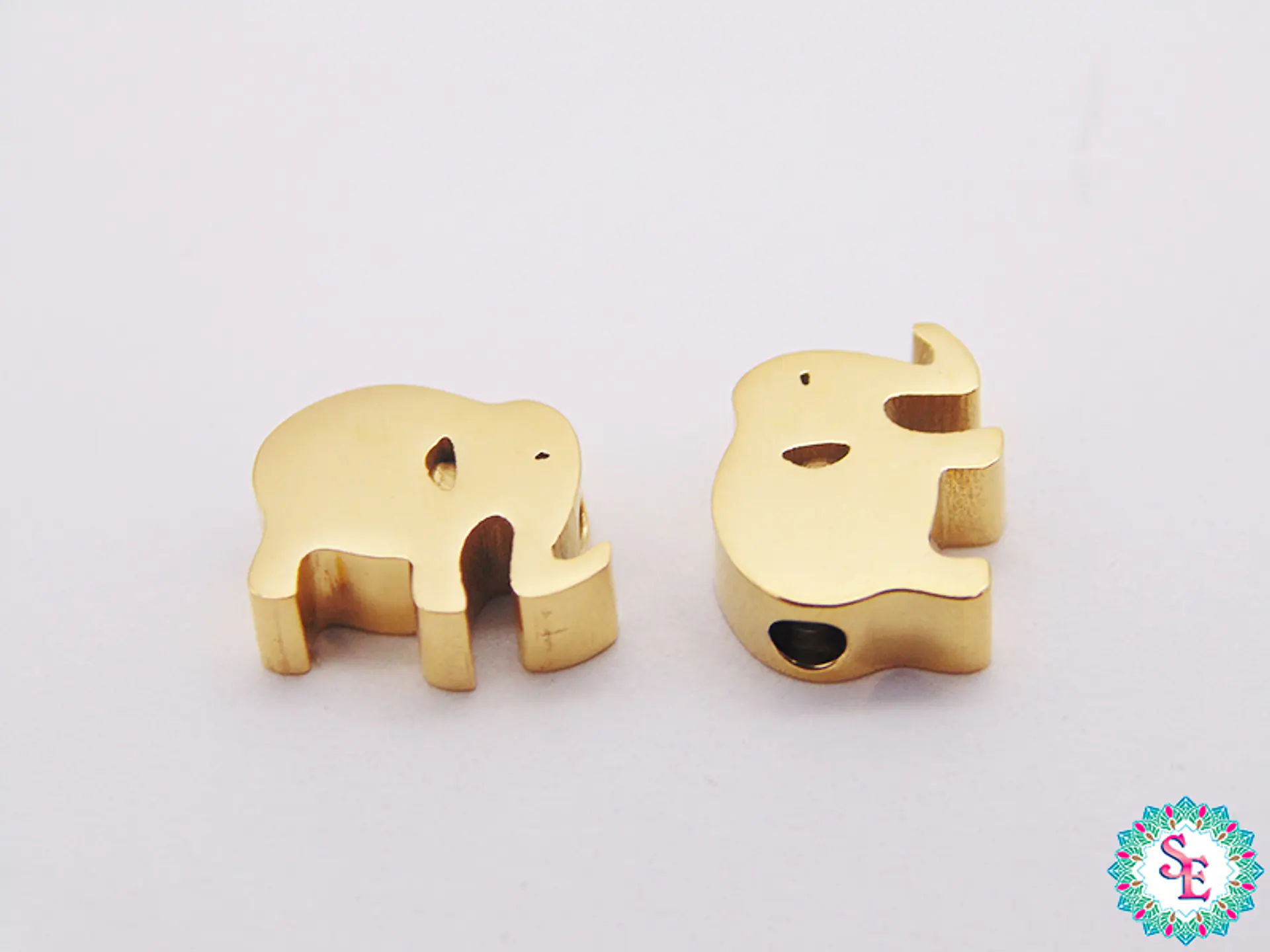 ACERO DORADO SEPARADOR ELEFANTE 10*7*3MM  1