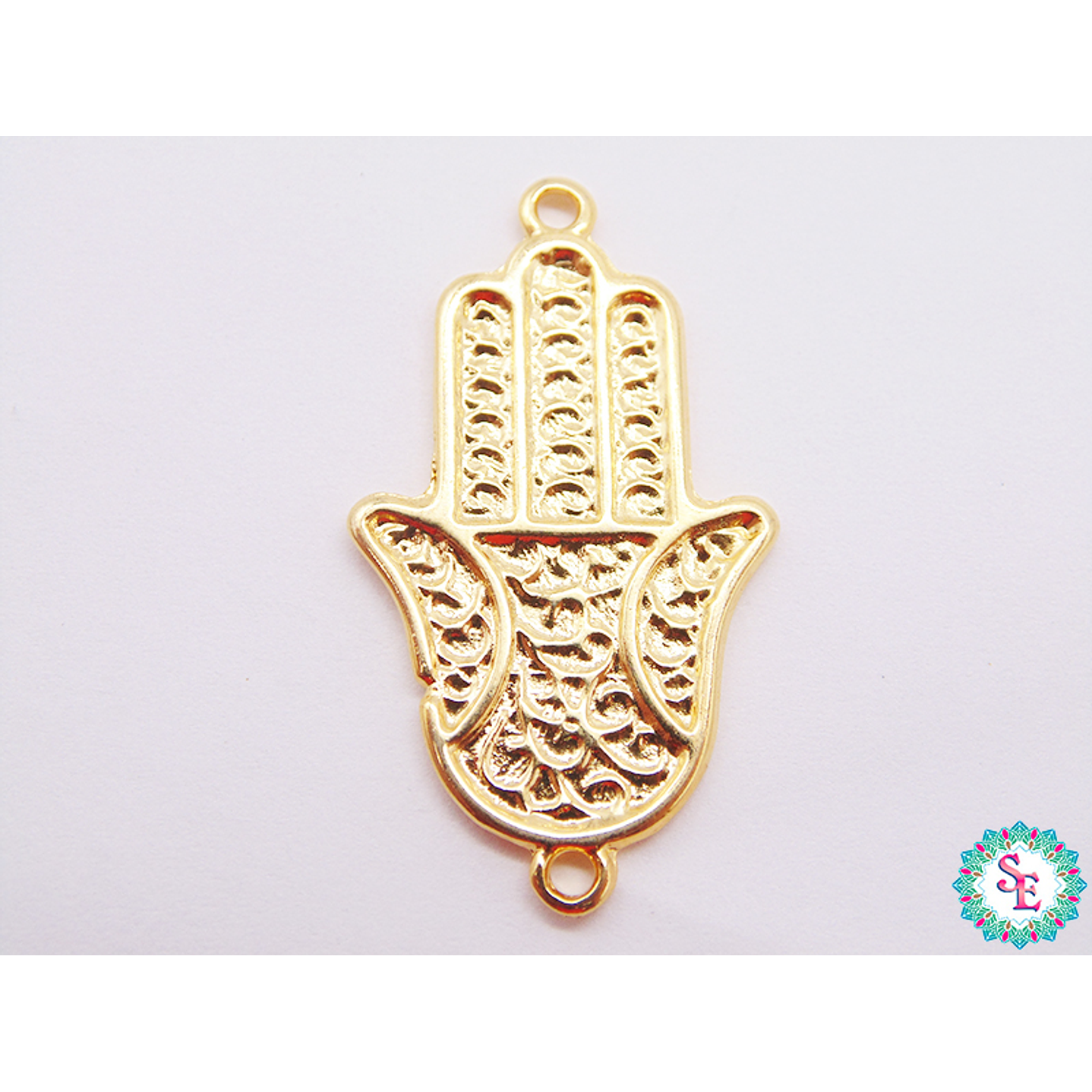 SAMAK DORADA CENTRO MANO HAMSA FORTUNA 36*20MM  1