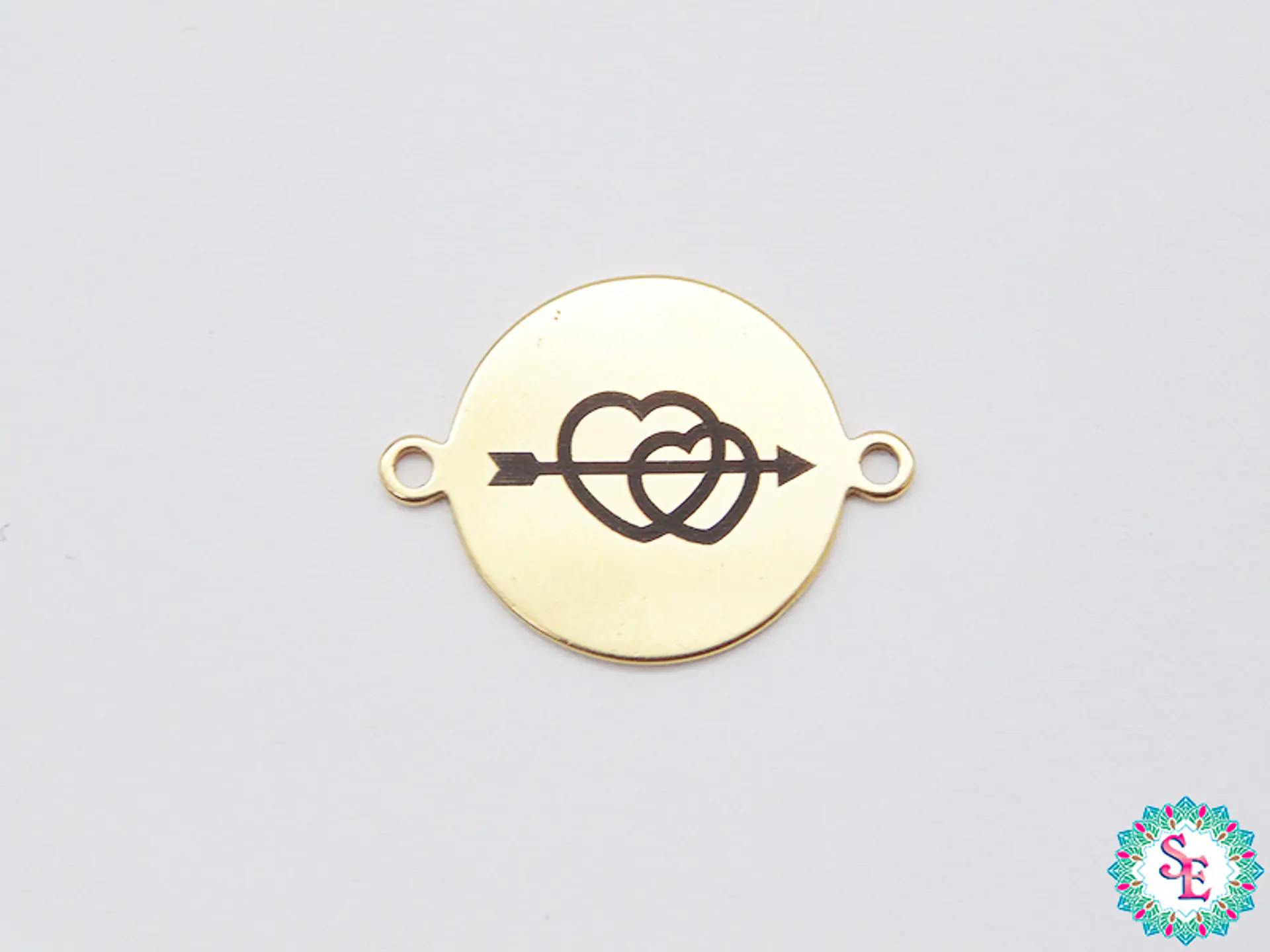 ACERO DORADO 16MM CORAZON DOBLE FLECHA  1