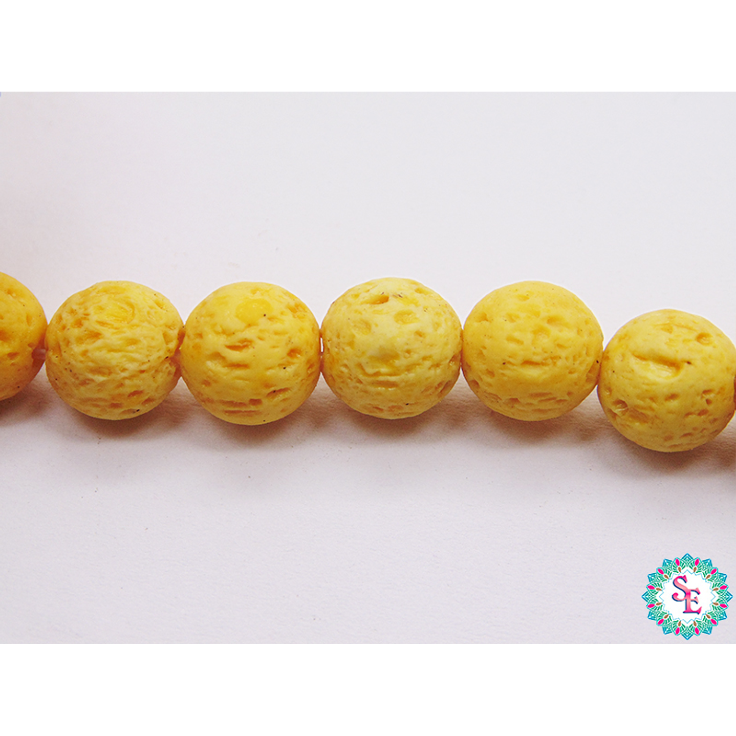 YELLOW VOLCANIC STONE # 8MM X 49 UNIT APPROX 1