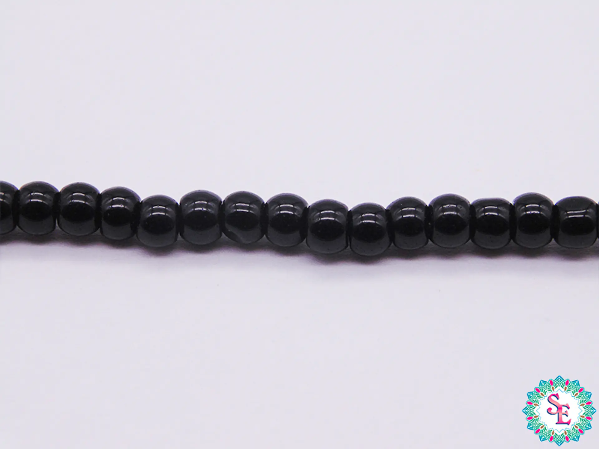 PERLA DE VIDRIO # 4MM NEGRO X 205 UDNA APROX  1