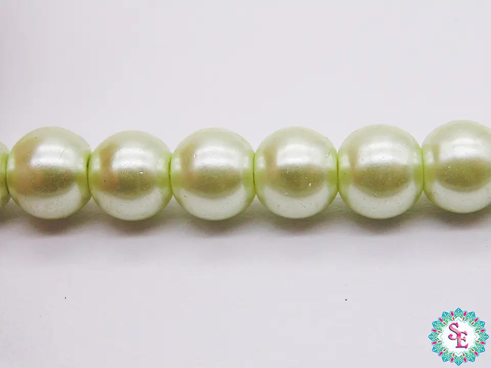 PERLA DE VIDRIO REDONDA # 8M VERDE PASTEL X 115 UND APROX  1