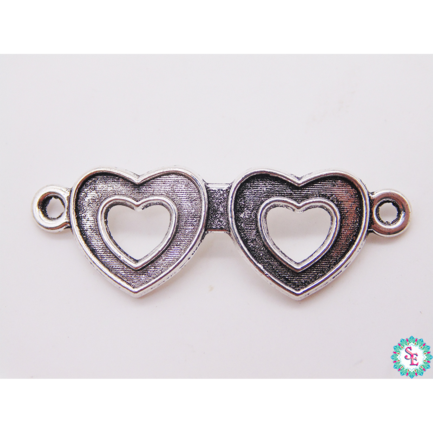 SAMAK PLATEADA CENTRO 23 DOS CORAZONES 37MM  1