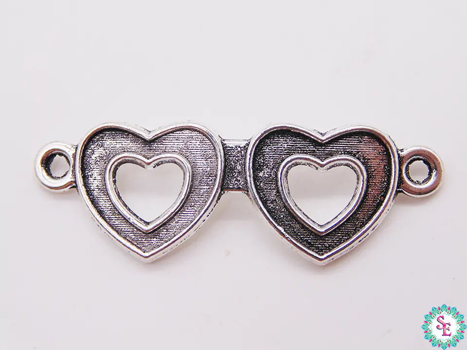 SAMAK PLATEADA CENTRO 23 DOS CORAZONES 37MM PAQUETE POR 9 UNIDADES APROX 1