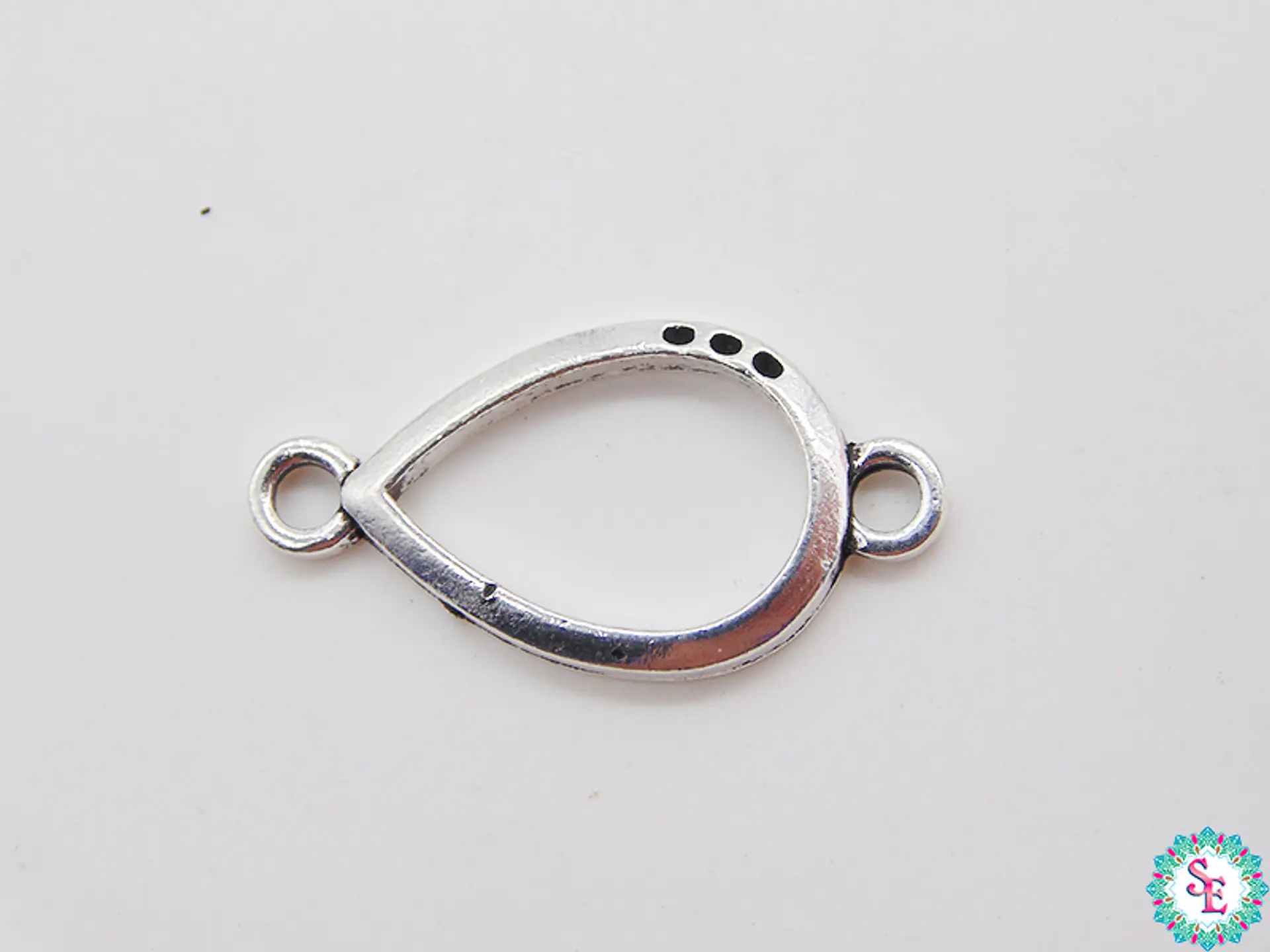 SAMAK PLATEADA CENTRO 82  LAGRINA CILUETA 23MM PAQUETE POR 19 UNIDADES APROX 1