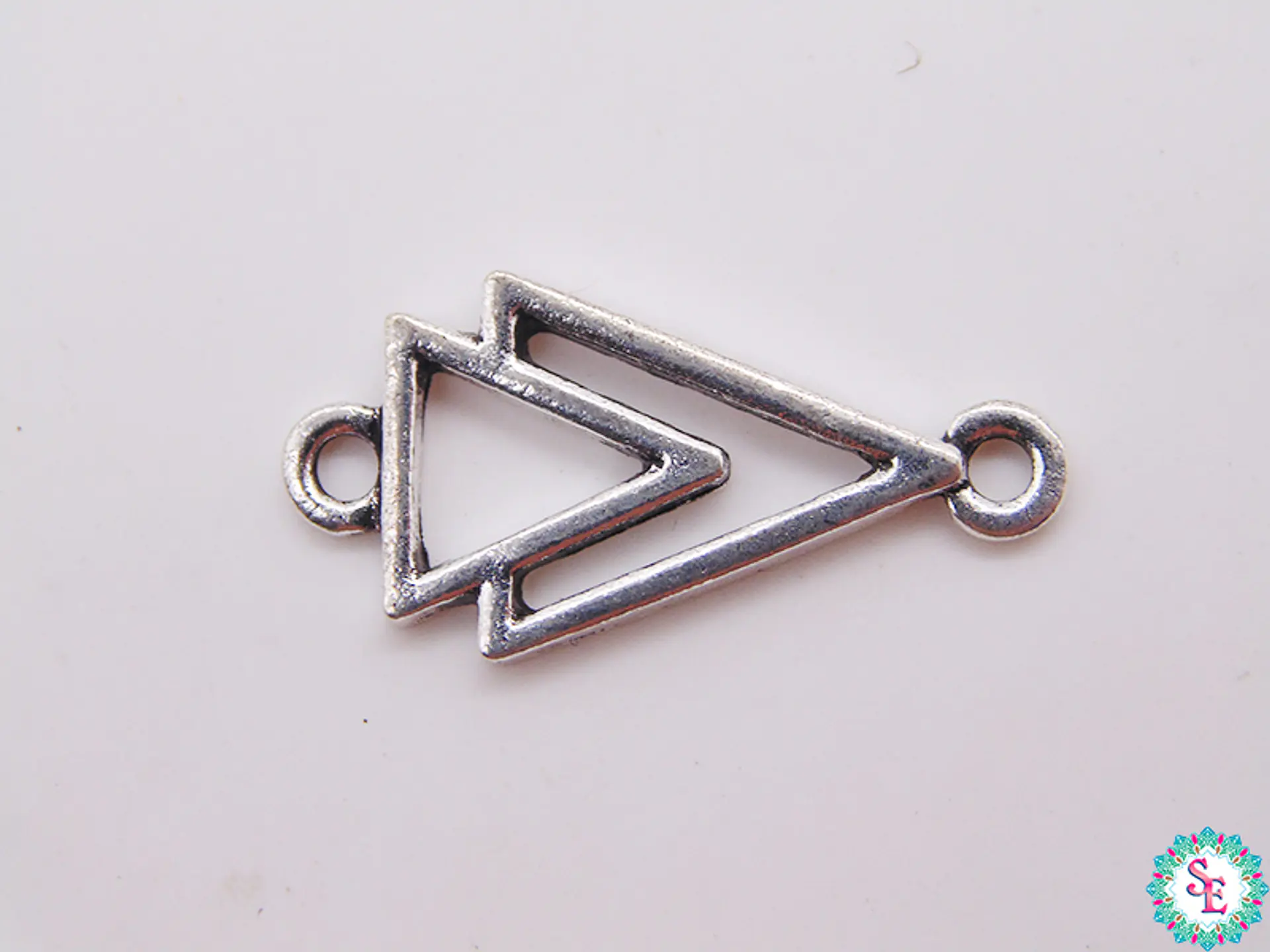 SAMAK PLATEADA CENTRO 78 TRIANGULO DOBLE 24MM PAQUETE POR 12 UNIDADES APROX 1