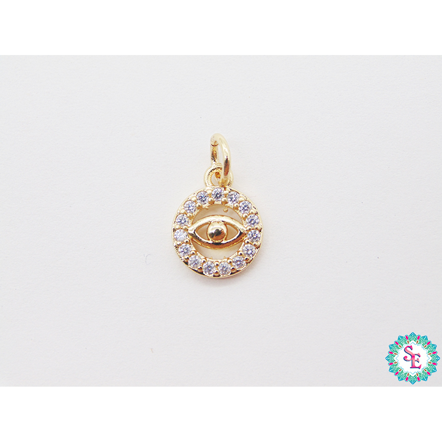RODIO DORADO DIJE CIRCULO OJO CIRCON BLANCO 9MM  1