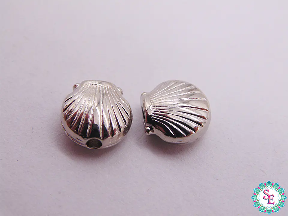 SAMAK NIQUELADO CENTRO CONCHITA 7MM X UND  1