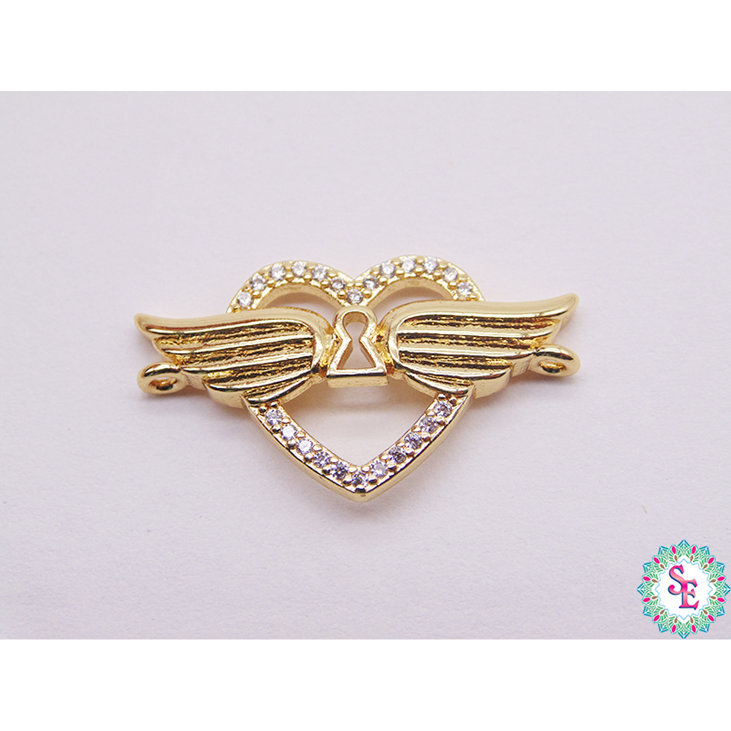 RODIO DORADO CORAZON ALAS CIRCON BLANCO 24.73*14.16MM 1