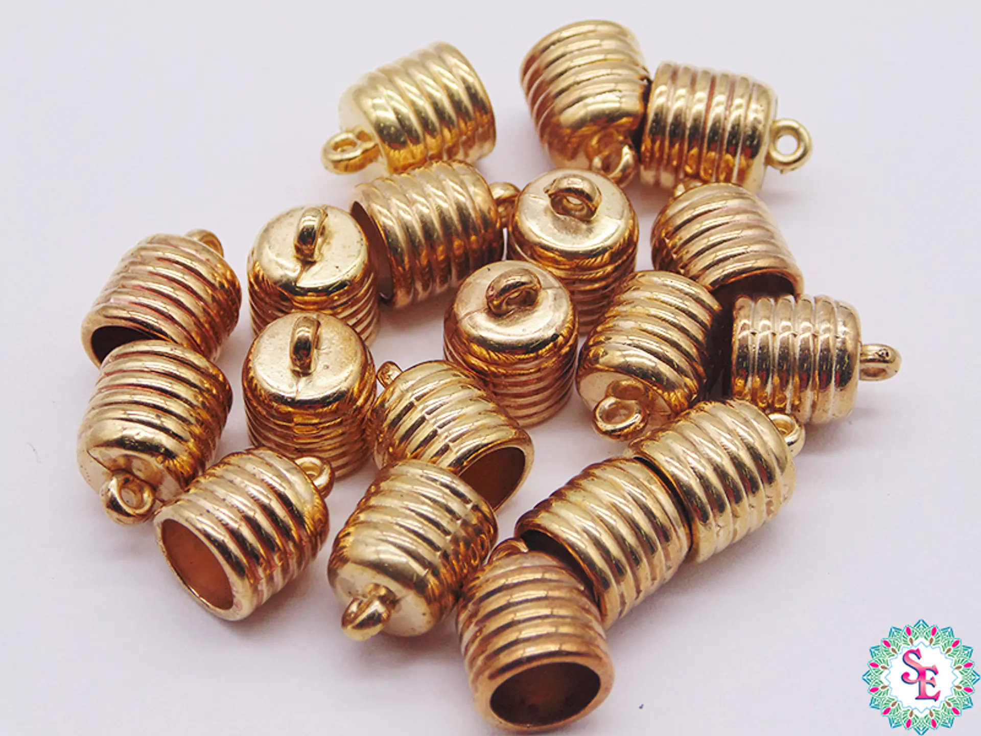 PLASTIMETAL CAMPANA 10MM DORADA RAYAS PAQ X 100 GRAMOS  1