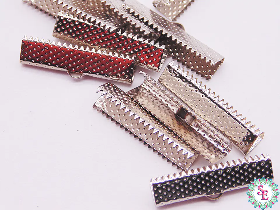 TERMINAL CARTERA 2.5CM NIQUELADO PAQ X 100 UND APROX  1
