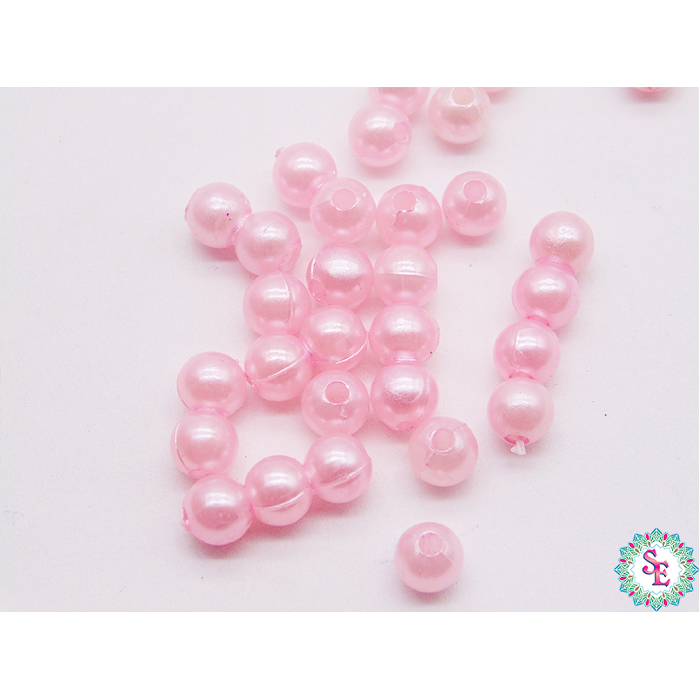 PERLA DE PLASTICO # 6MM ROSADO PQ*500 GRAMOS 1