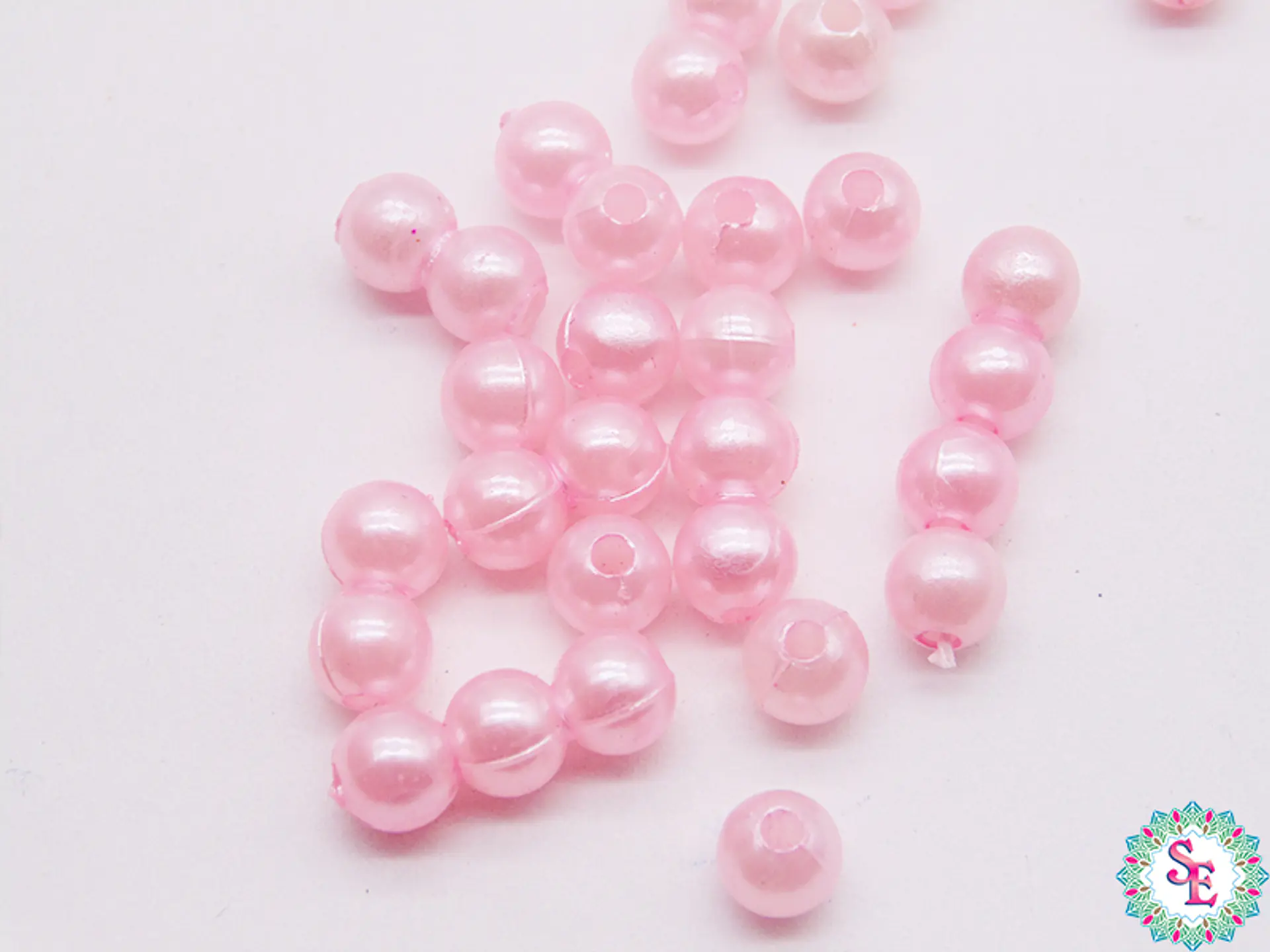 PERLA DE PLASTICO # 6MM ROSADO PQ*500 GRAMOS 1