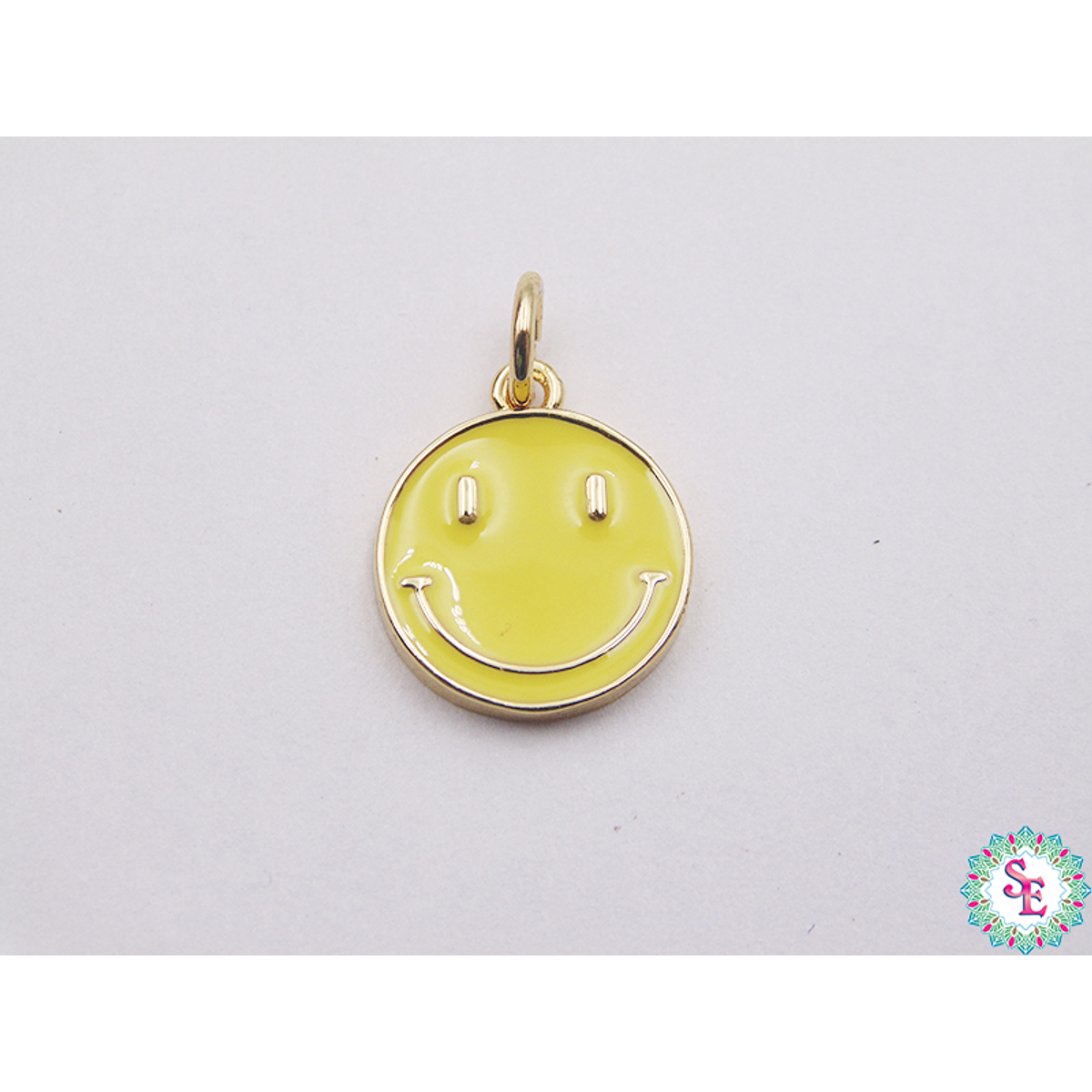 RHODIUM GOLDEN YELLOW HAPPY FACE PENDANT 12MM X UND