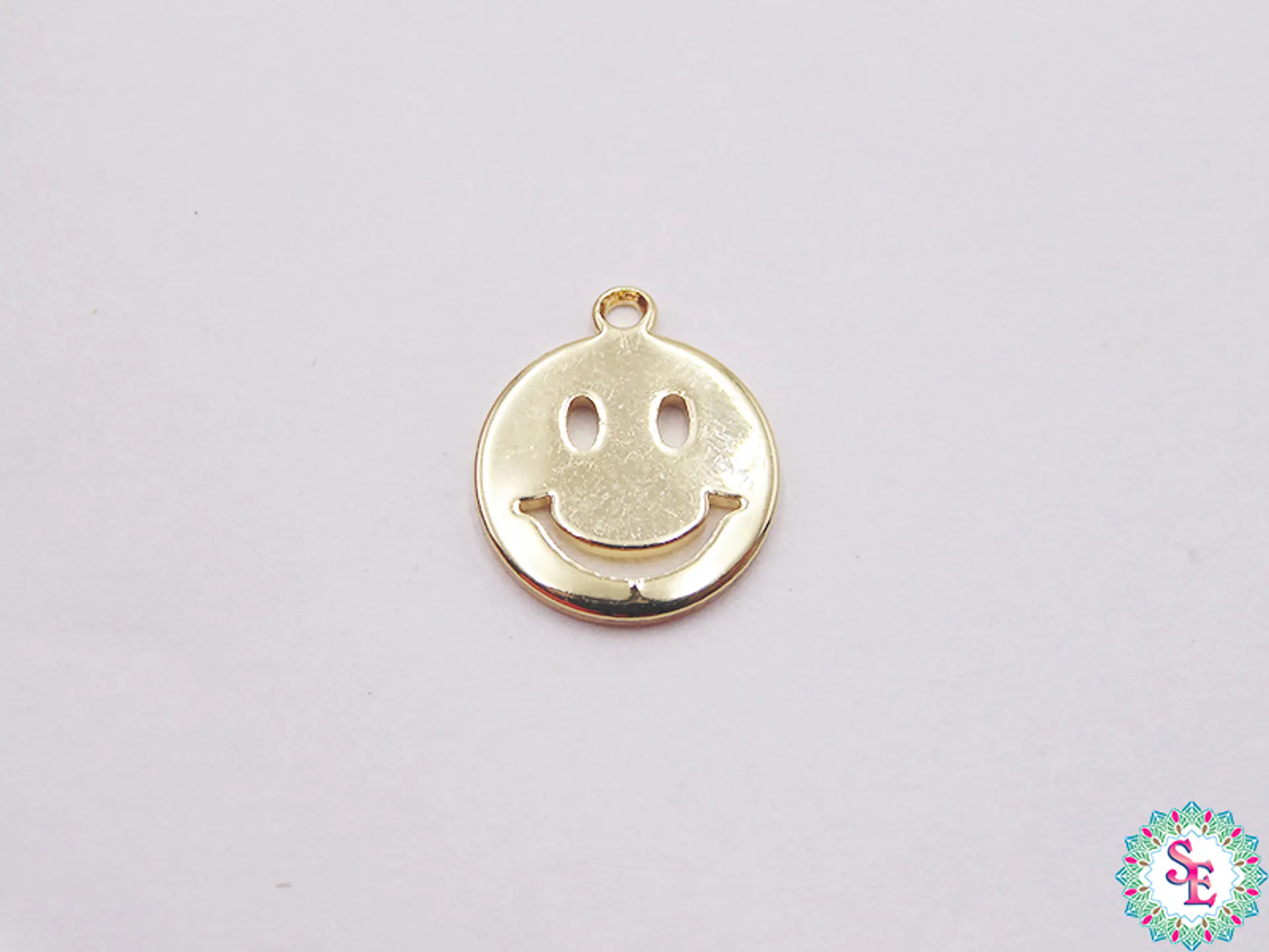 RODIO DORADO DIJE 11MM CARA FELIZ 575D 1