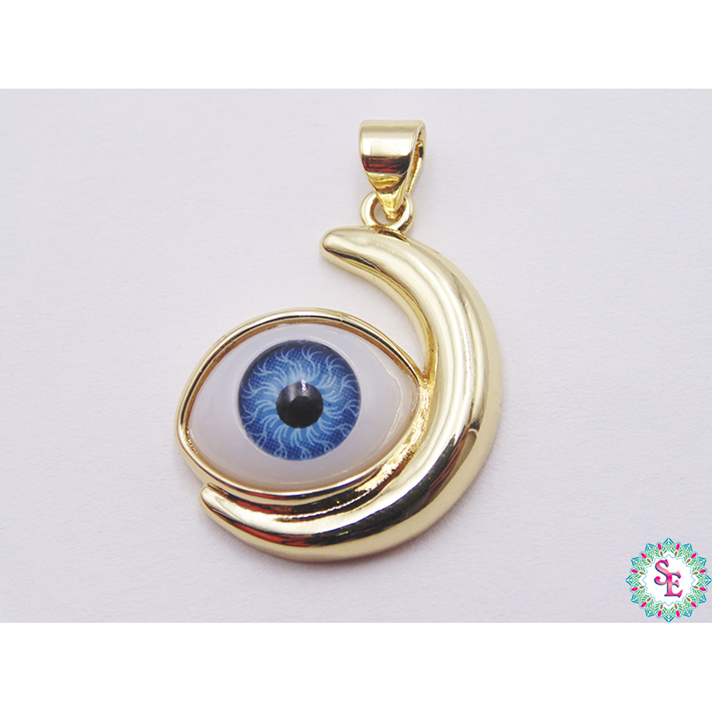 RODIO DORADO DIJE OJO AZUL CLARO LUNA 18MM 1