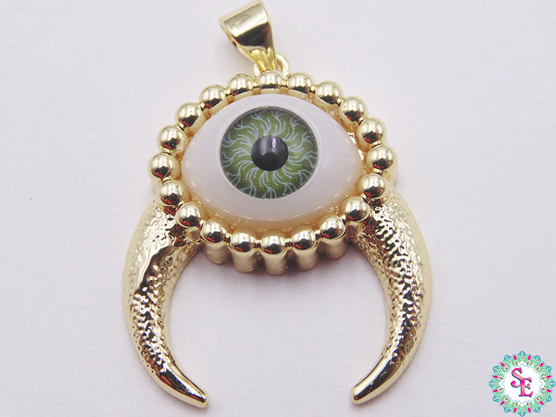 RODIO DORADO DIJE OJO VERDE CACHOS 26MM  1