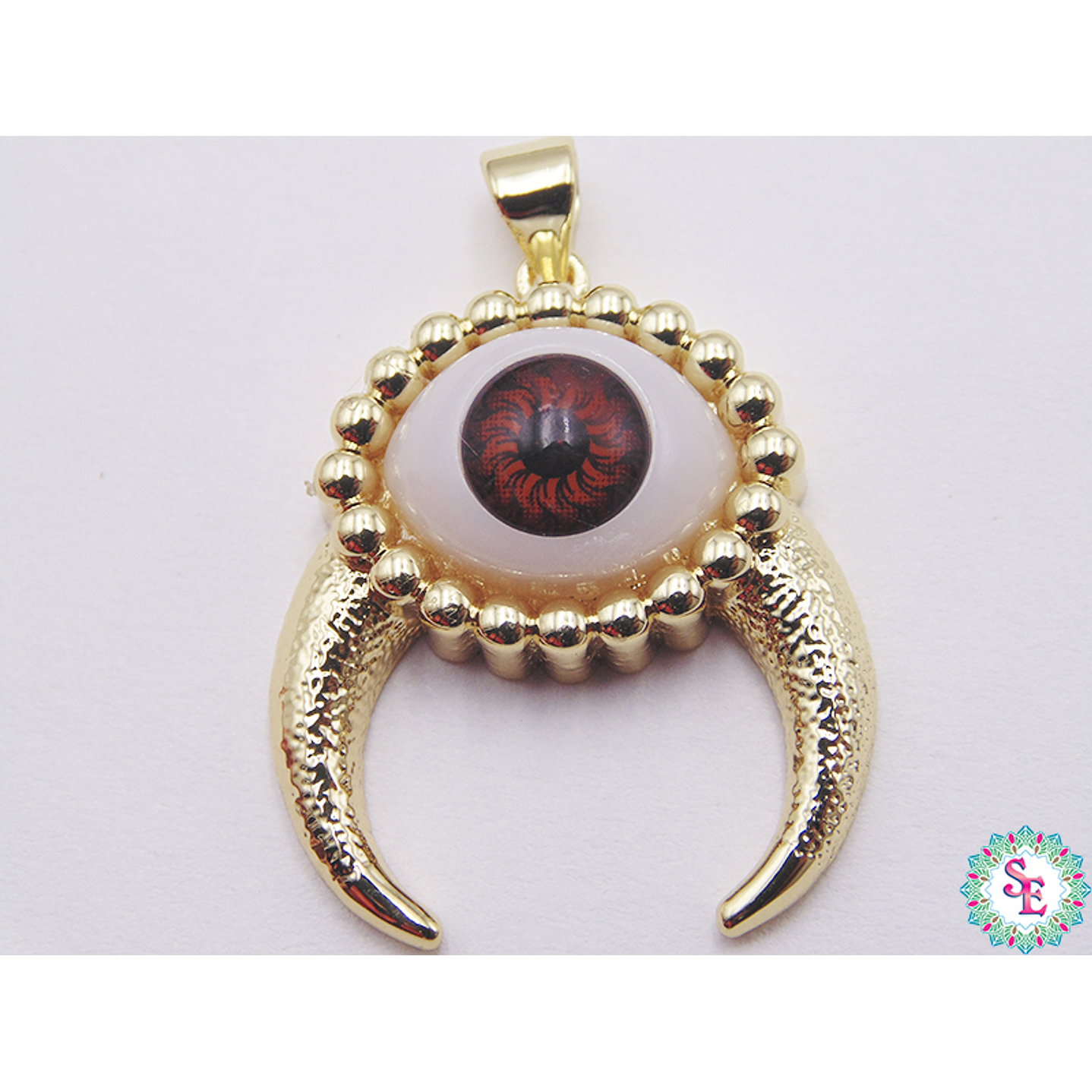 RODIO DORADO DIJE OJO CAFE CACHOS 26MM 1