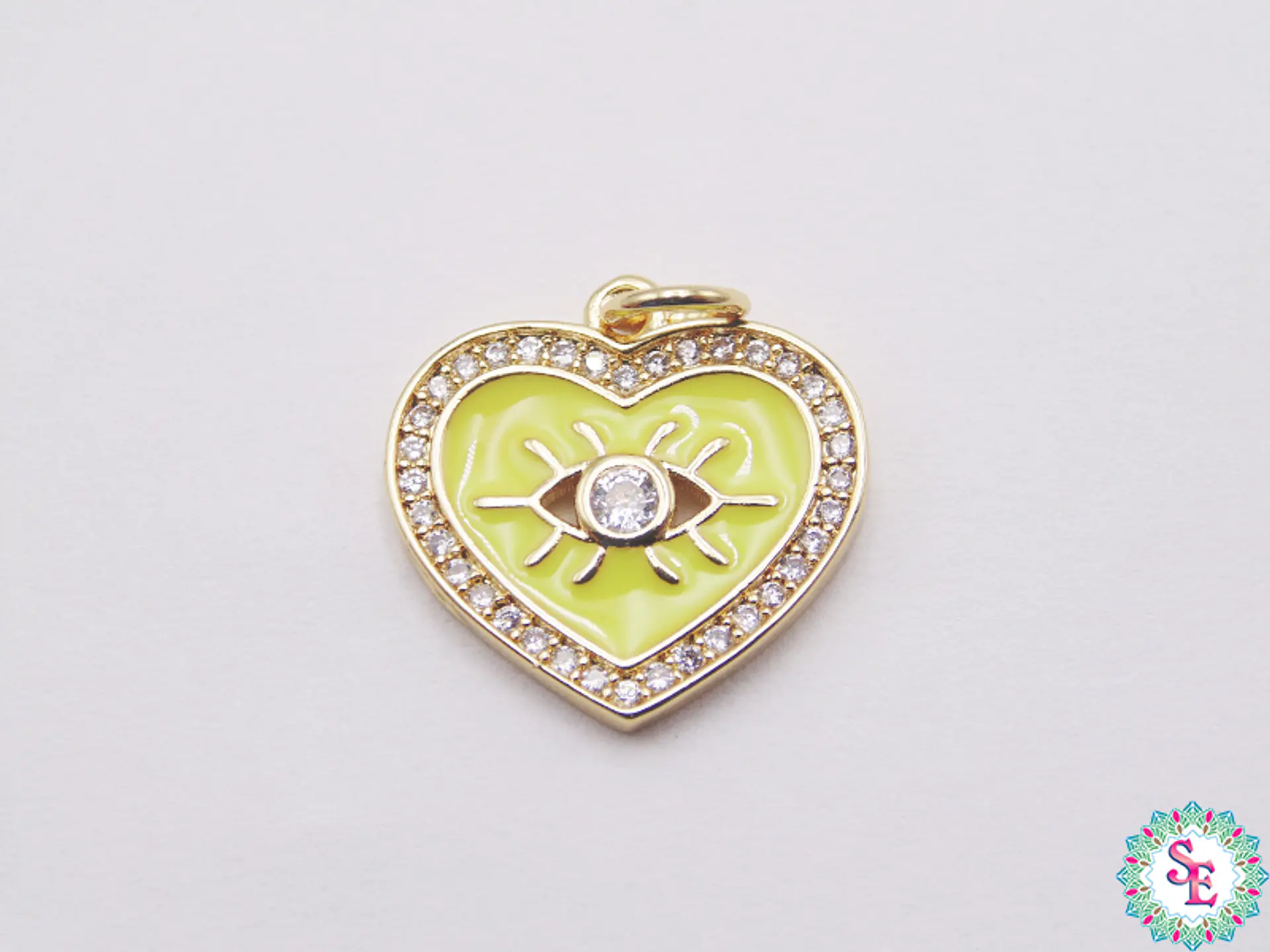 RODIO DORADO DIJE CORAZON AMARILLO NEON OJO CIRCON 16MM 1