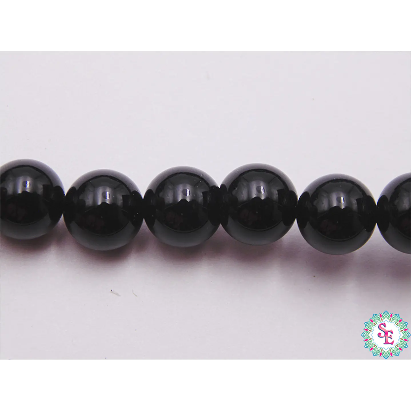 PIEDRA NATURAL LISA AGATA # 6MM NEGRA X 64 UND APROX  1