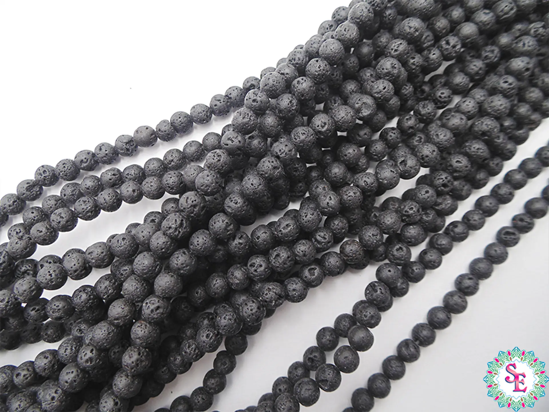 SARTA DE PIEDRA 6MM  VOLCANICA NEGRA  X64 UND APROX. 2