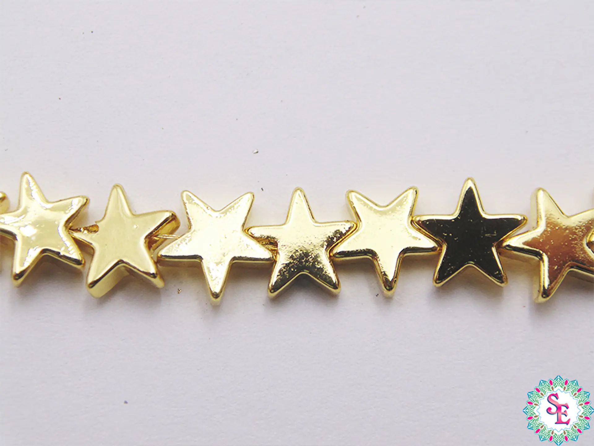 GOLDEN RUBBER STAR 8MM X 32 UNIT APPROX 1