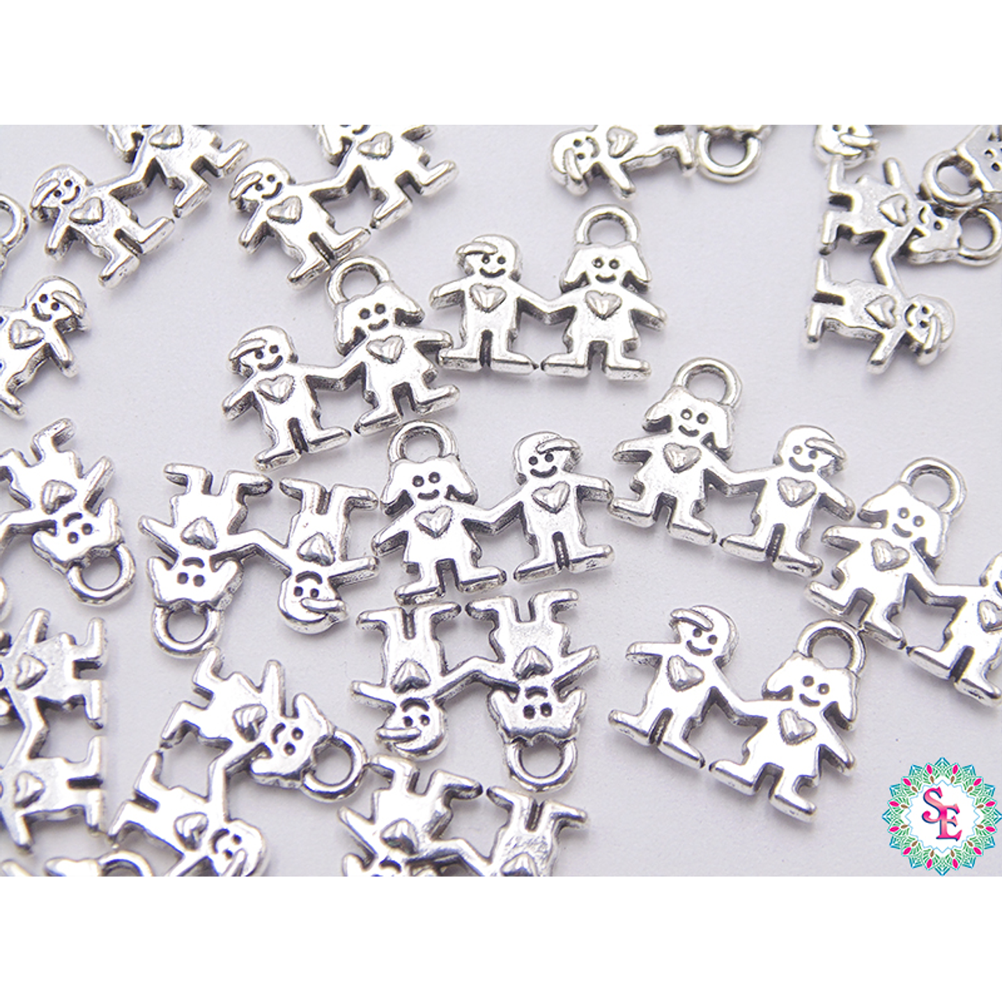 SAMAK PLATEADA DIJE 51  NIÑO Y NIÑA CORAZON 11MM  1