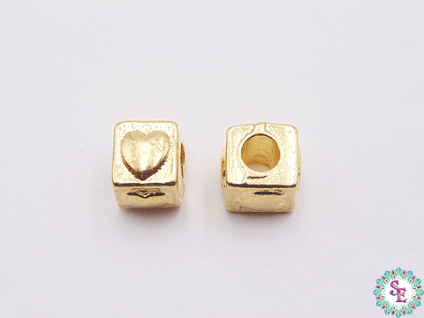 SAMAK DORADA CENTRO DADO CORAZON GDE 8MM