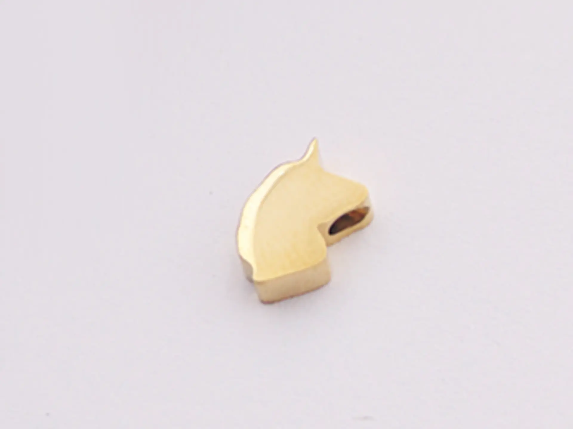 ACERO DORADO SEPARADOR UNICORNIO 8*5*3MM  1