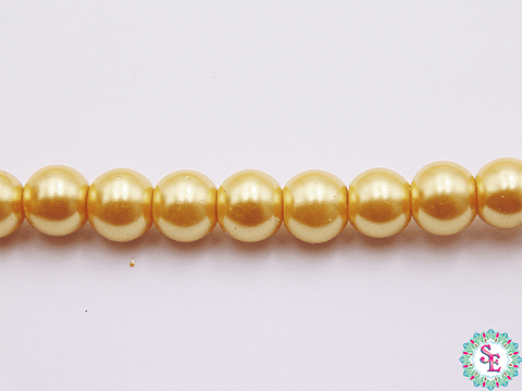 PERLA DE VIDRIO REDONDA #6M DORADO CLARO X 145 UND APROX 